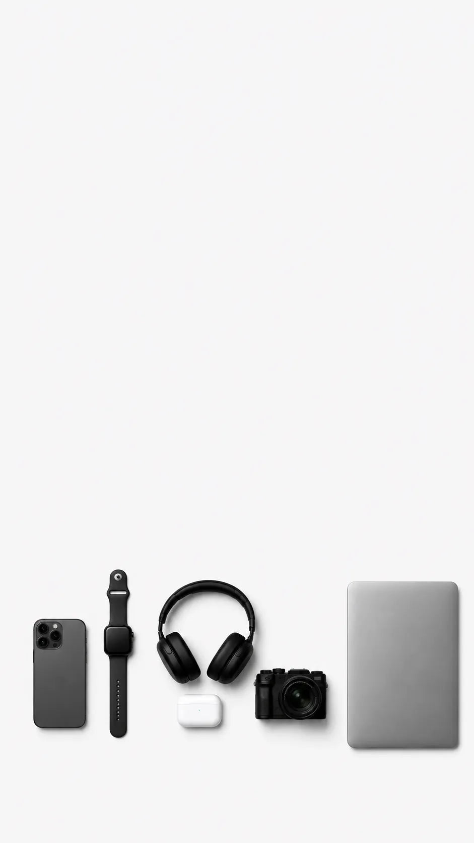 A minimalist flat-lay arrangement of black tech accessories on a light gray background, including a smartphone, smartwatch, over-ear headphones, a small camera, a white earbud case, and part of a silver laptop.